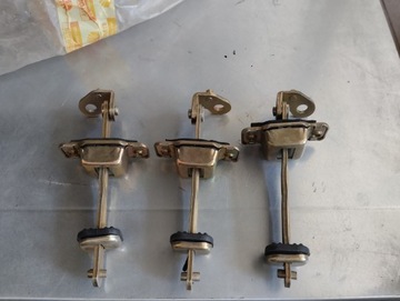 Обмежувач двері задніх зад лівий daewoo lanos 96304088 фото №1