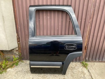 Chevrolet tahoe gmc yukon 00-06r двері задні ліві фото №1