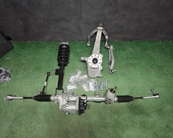 Поворотна опора ліва перед рейка рульового управління важіль tesla y фото №1