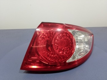 Hyundai santa fe ii cm лампа зад правая наружная 92402-2b000 фото №1