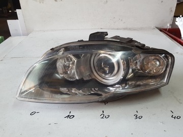 Audi a4 b7 04-07r лампа bi-xenon ліва перед англієць фото №1