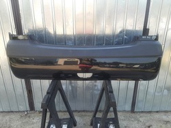 Бампер зад задній kia rio ii 5d 5 двері роки 2005-2011 чорний хетчбек фото №1