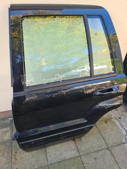 Двері задні ліві jeep grand cherokee wj 99-04 фото №1