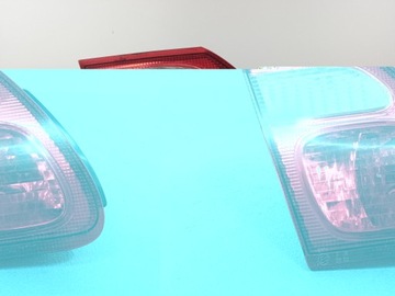 Almera n16 рестайлінг sedan лампа зад ліва w кришка багажника фото №1