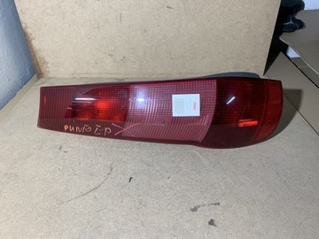 Лампа левая зад fiat punto 7730723 фото №1