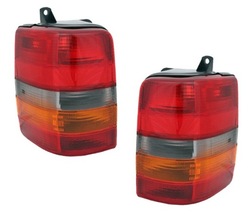 Лампа зад новая jeep grand cherokee zj 1993-98 kpl фото №1