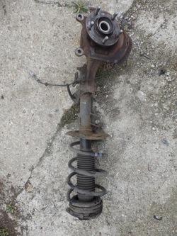 Амортизатор поворотна опора лівий перед qashqai j10 1.5 фото №1