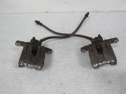 Kia sportage iii супорт гальмівний зад фото №1