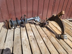 Forester I поворотный кулак, цапфа левый передний амортизатор пневматический