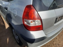 задний левый фонарь Honda JAZZ 2002 год