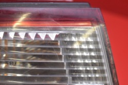 фонарь левый kia CARENS 2 II 02-06