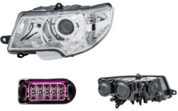 фара левая SKODA SUPERB 08-13 Hella