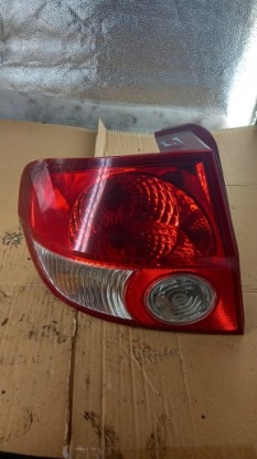 фонарь левый Hyundai GETZ 1.4b 03R HB