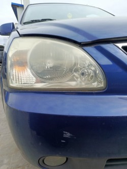 kia CARENS II 2005 фара правая европа