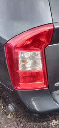 kia CARENS III фонарь левый