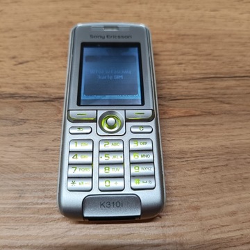 Мобильный телефон Sony Ericsson k310i с зарядным устройством * разблокировка на плюс*