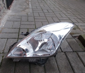 SUZUKI BALENO II 15+ LEWA PRZEDNIA LAMPA ORYGINAŁ EUROPA