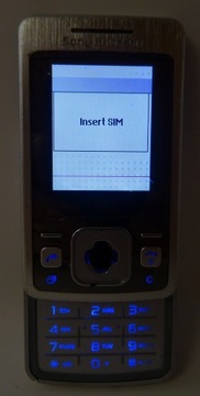 Sony Ericsson t303 справний без En срібло без замків + зарядний пристрій + акумулятор