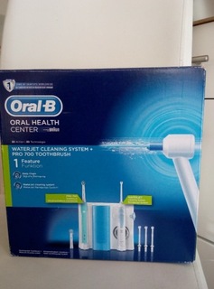 Іригатор WaterJet + зубна щітка Oral-B 6 наконечників