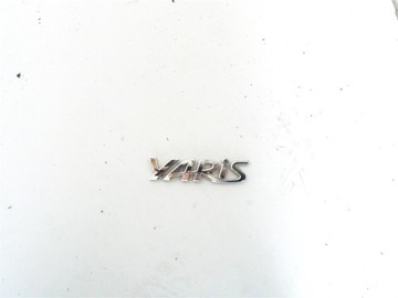 НАДПИСЬ YARIS ЗАДНЕЙ КРЫШКИ БАГАЖНИКА TOYOTA YARIS II 2006-2011