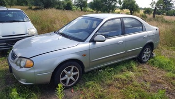 ДВЕРЬ ЛЕВАЯ ЗАДНЕЕ KIA SHUMA II 2003 1.8