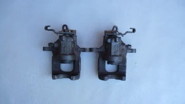 ТОРМОЗНОЙ СУППОРТ ЛЕВЫЙ ЗАДНИЙ VW TOURAN II