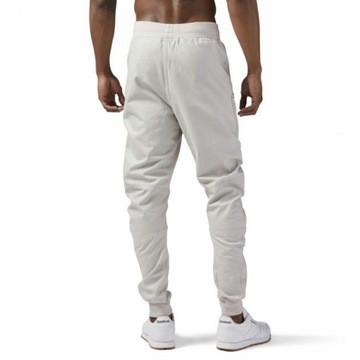 ПАКЕТ REEBOK CLASSIC GRAPHIC Q1 БЕЖЕВЫЕ БРЮКИ ДЛЯ ДЖОГГЕРА M