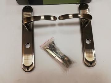 Klamka długi szyld DOMINO NOVA M3 WC 72mm