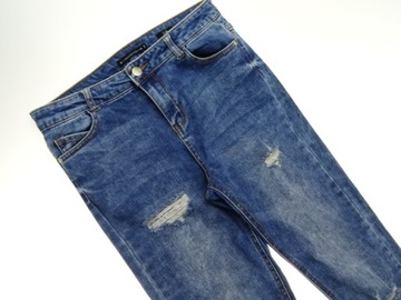 54__RESERVED__spodnie damskie JEANS dziury__38 M