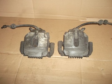 ZACISK PRZEDNI PRZÓD LEWY BMW E90 E91 2.0D 04-11r