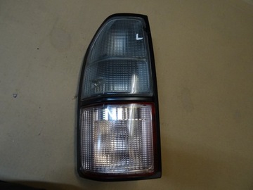 LAND CRUISER 90 95 LAMPA LEWY TYŁ LEWA W BŁOTNIK