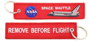 СНИМИТЕ ПЕРЕД ПОЛЕТОМ брелок для ключей космического корабля