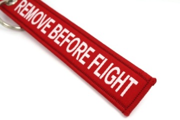 Снимите подвеску-брелок RBF перед полетом КАЧЕСТВО!