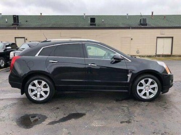 ZVEDÁK OKNO PRAVÝ PŘEDNÍ CADILLAC SRX 2010