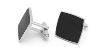 Классические черные запонки для рубашки и красный футляр.