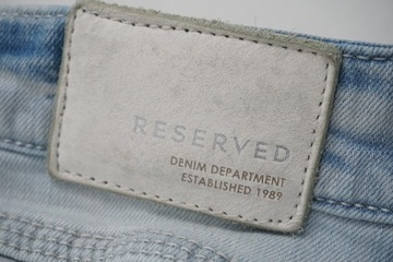 RESERVED spodnie jeansy z dziurami r 27/32