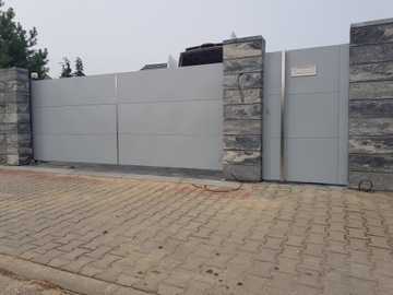 Современные секционные откатные ворота из алюминия.