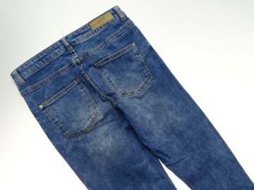 54__RESERVED__spodnie damskie JEANS dziury__38 M