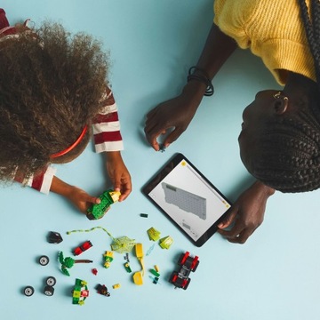 KLOCKI LEGO HEROES 11198 POŚCIG SPINA ZA ELECTRO W DINOPOJEŻDZIE + TORBA