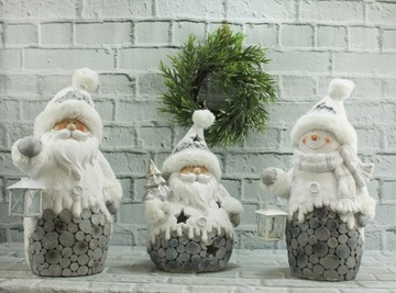 Фигурка ребенка в снегу на фигурке снежок