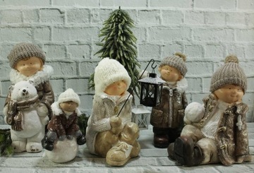 Декоративная фигурка ребенка на санках H20