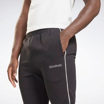 Spodnie Joggery z lamówką Reebok GS9310 M