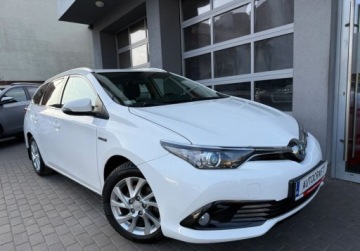 Toyota Auris II Touring Sports Facelifting 1.8 Hybrid 136KM 2016 Toyota Auris salon Polska, Podgrzewane fotele, Kamera 1.8 Hybryda 136KM, zdjęcie 19