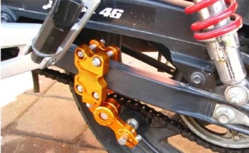 НАТЯЖИТЕЛЬ ЦЕПИ ДЛЯ НАПРАВЛЯЮЩЕЙ МОТОЦИКЛА СДВИГАЮЩИЙ РОЛИК CNC ОРАНЖЕВЫЙ