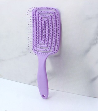 Спиральная массажная щетка для распутывания волос.