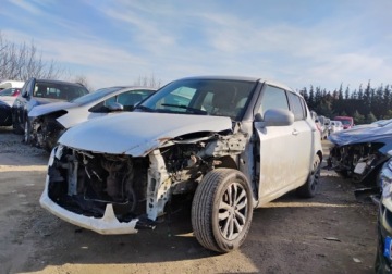 Suzuki Swift V Hatchback 3d Facelifting 1.2 VVT 94KM 2015 Suzuki Swift I rej 2016r, 1.3 Benzyna. Uszkodzony lewy przod i prawy tyl., zdjęcie 1