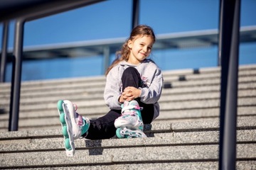 Регулируемые роликовые коньки RAVEN Lia Mint 27-30 со светодиодным колесом