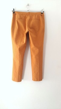 619. RESERVED musztardowe spodnie rurki cygaretki r 36