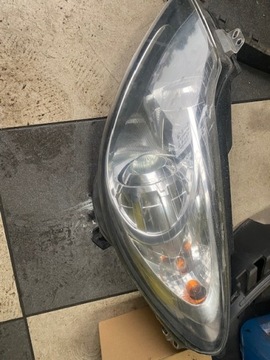 OPEL CORSA D PRZED LIFT SOCZEWKA LEWY