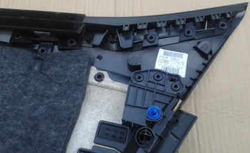 Tapicerka lewa boczek drzwi lewy tył Opel Astra V K 39060599